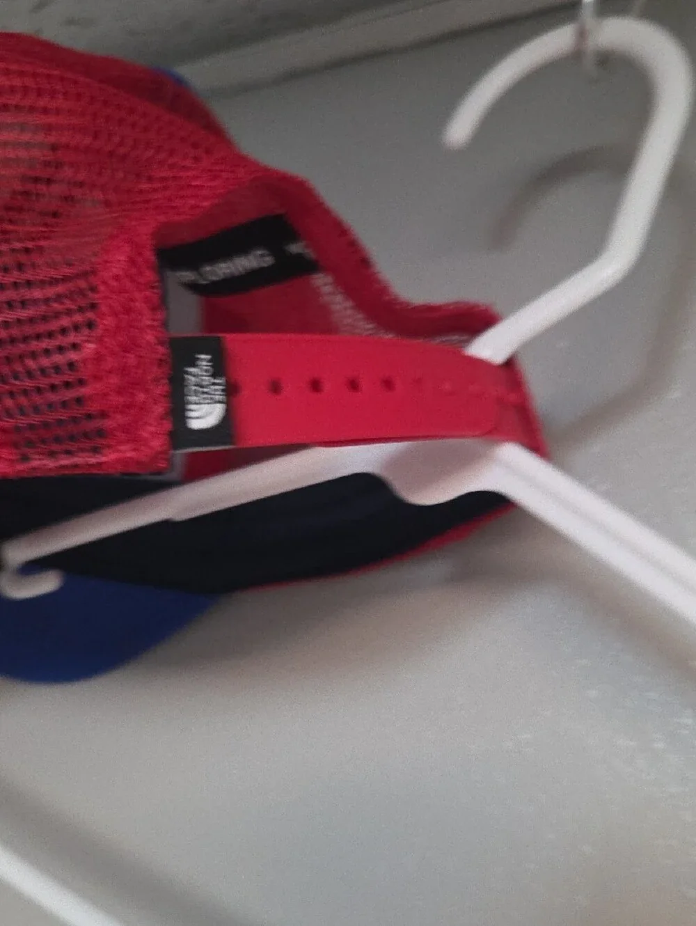 The North Face Kids Royal Blue and Red Mesh Trucker Hat